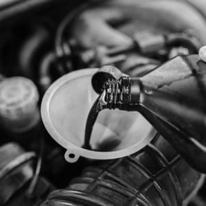 Gears-Pouring-Oil-Into-Funnel